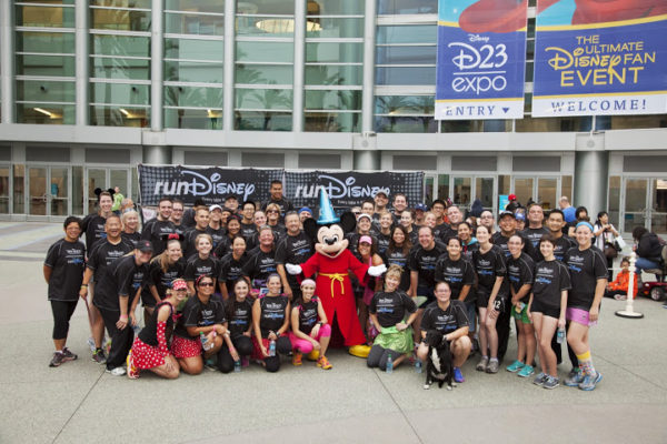 50 runDisney D23 Fun Run participants in front of the Anaheim Convention Center before the D23 Expo