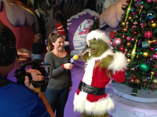 Sparkly Nicole with the Grinch for Orlando Attractions Magazine The Show