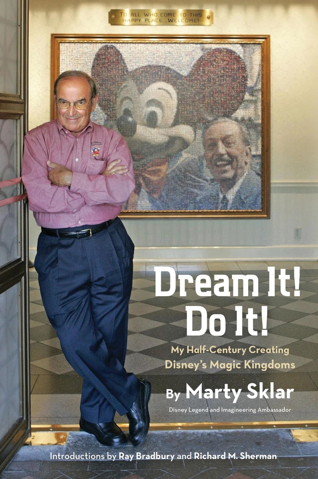 Marty Sklar's Dream It! Do It! book cover with him leaning against a wall with his arms crossed in front of a photo of Walt Disney and Mickey Mouse on a wall.