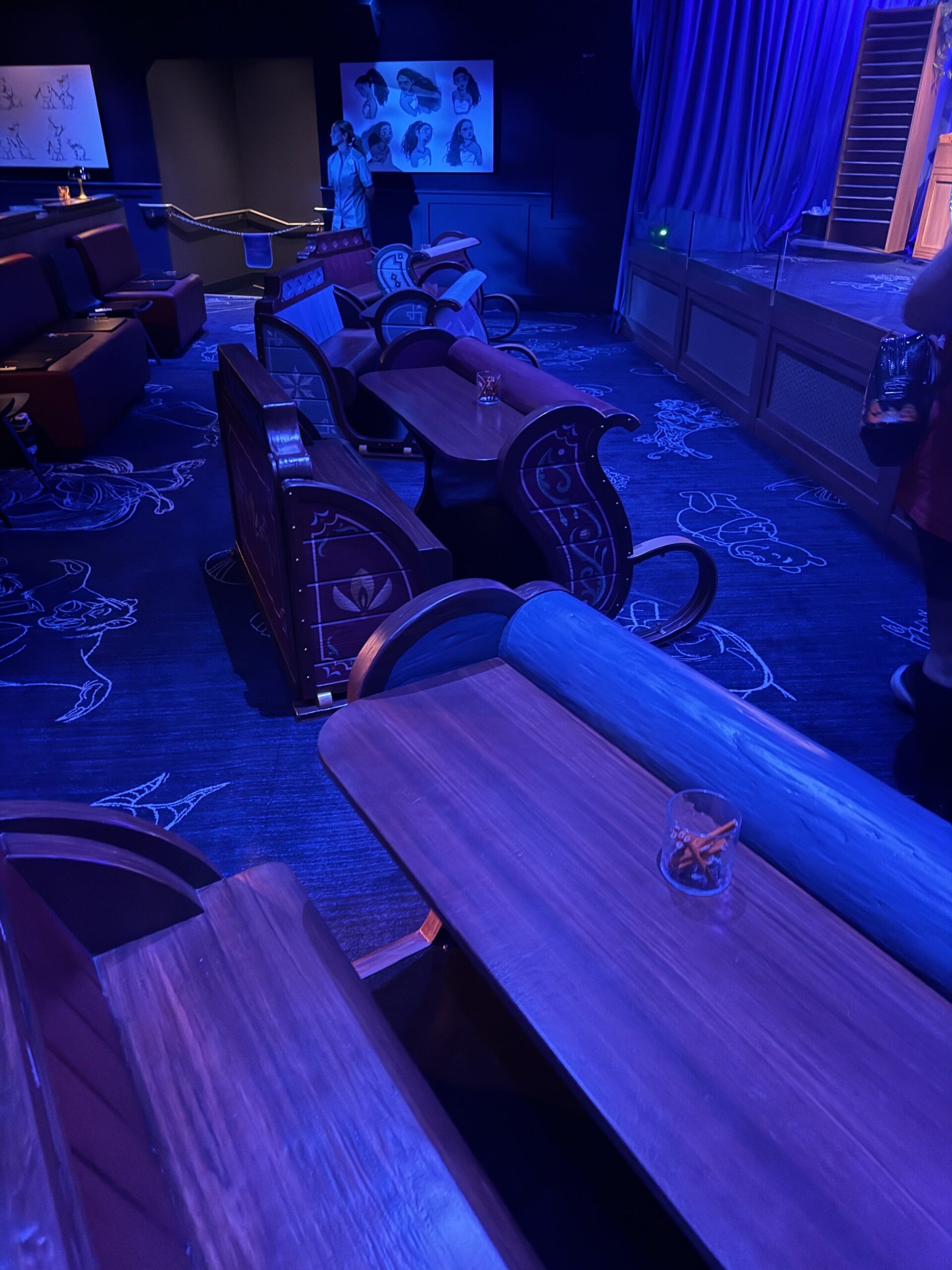 Olaf Draws sled seating in a blue lit room